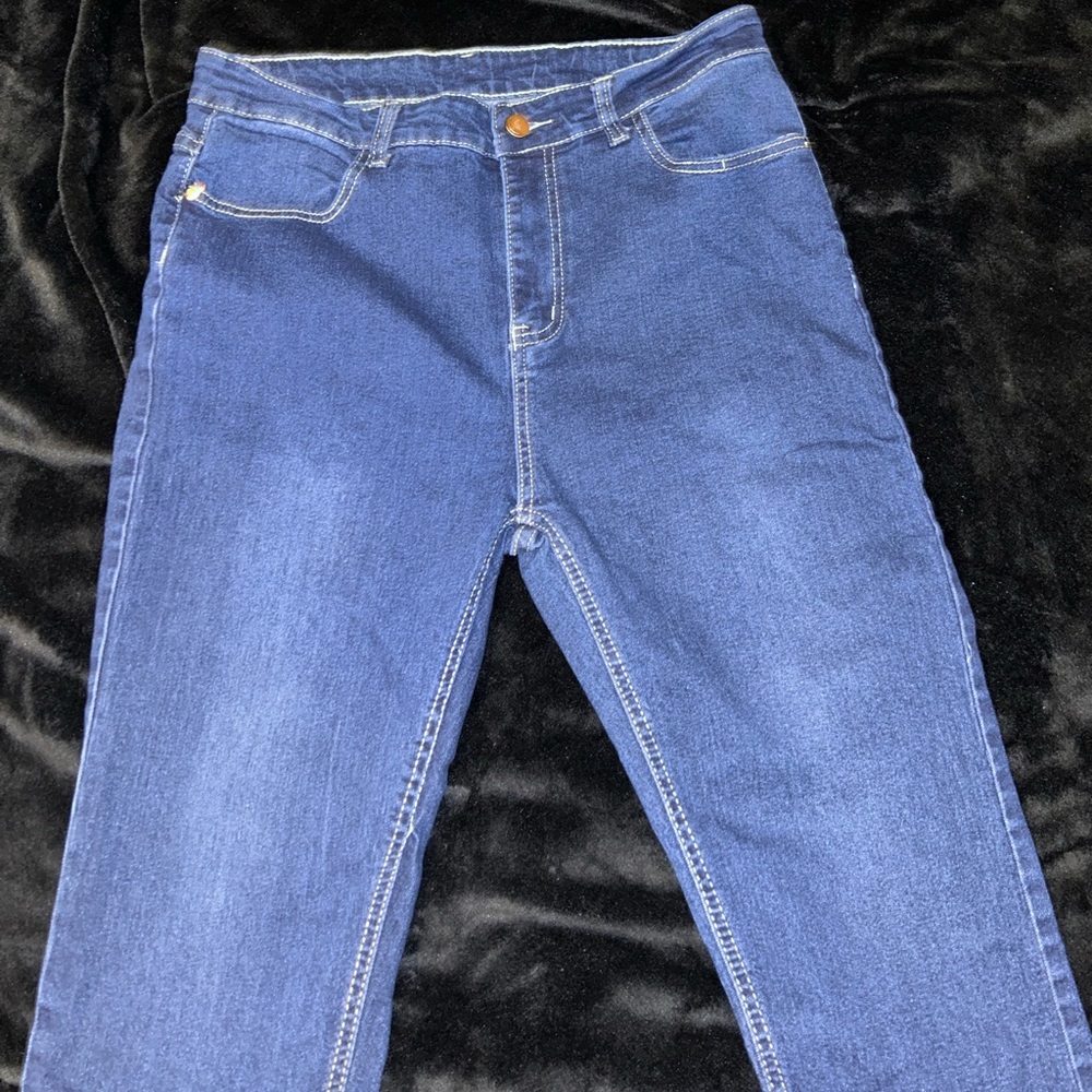 High rise blue jeans